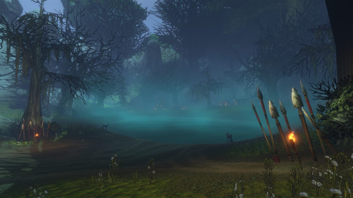 A misty valley in Shen'dralas with ancient night elf ruins among the trees